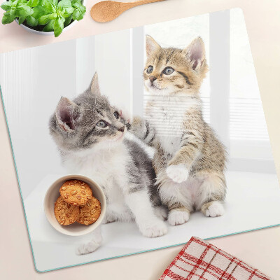 Glass chopping board Cats on a white background