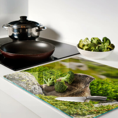 Glass chopping board Marmot on a background of green grass