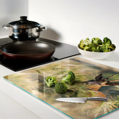 Glass chopping board A deer in a field