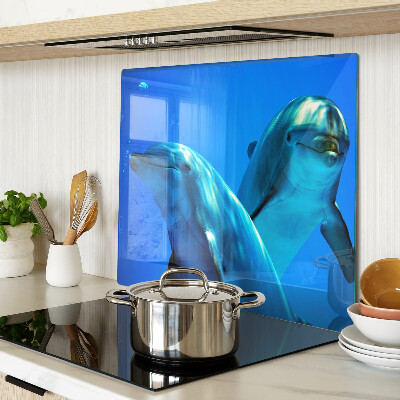 Glass kitchen board Dolphins in the water