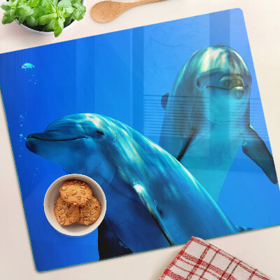 Glass kitchen board Dolphins in the water
