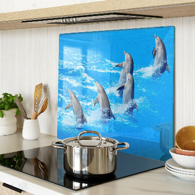 Glass kitchen board Dolphins jumping over waves