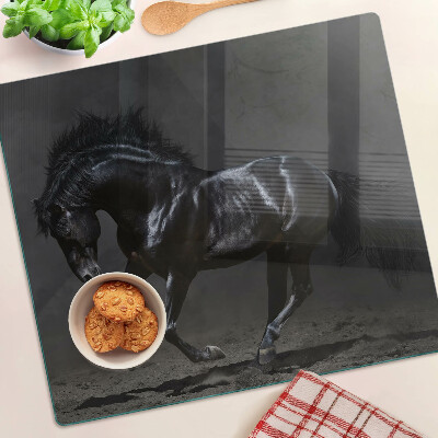 Glass chopping board Dark horse on the move