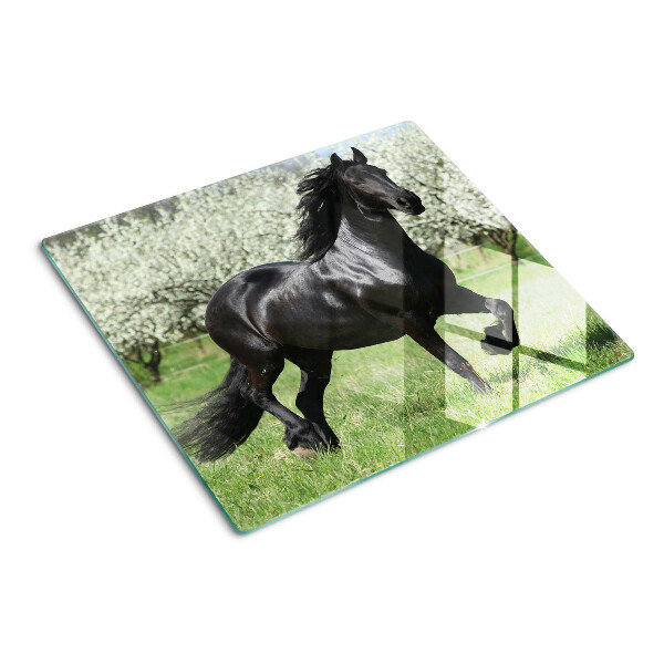 Glass chopping board Black horse in the meadow
