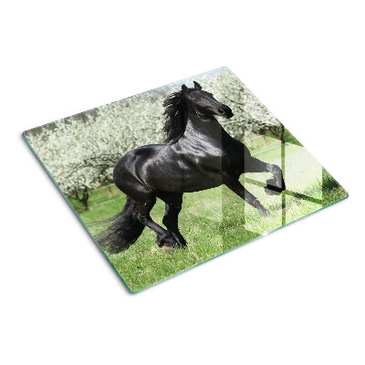 Glass chopping board Black horse in the meadow