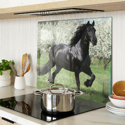 Glass chopping board Black horse in the meadow