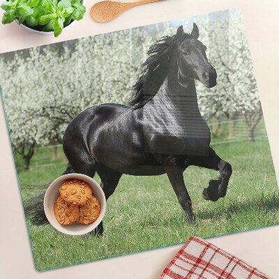 Glass chopping board Black horse in the meadow