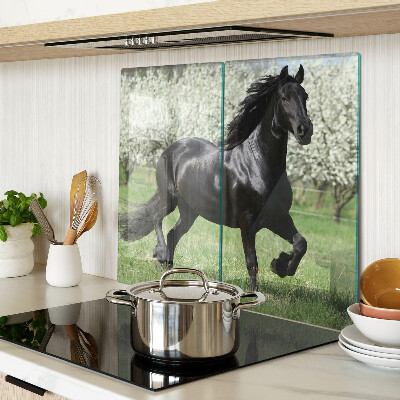 Glass chopping board Black horse in the meadow