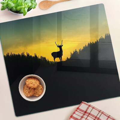 Glass kitchen board Deer against the backdrop of the setting sun