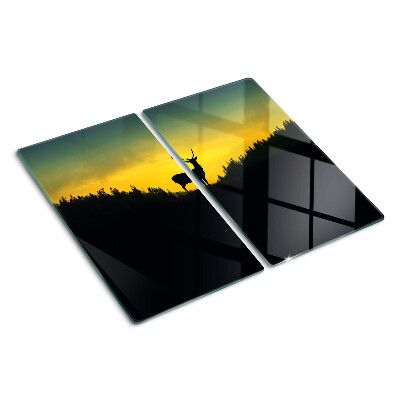 Glass kitchen board Deer against the backdrop of the setting sun