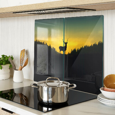 Glass kitchen board Deer against the backdrop of the setting sun