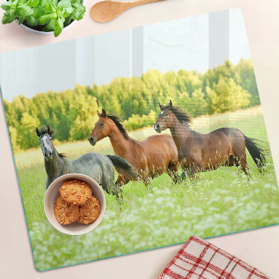 Glass chopping board A meeting of horses in the field