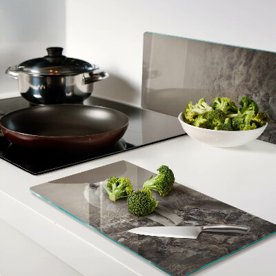 Glass kitchen board Wolf on a rocky mountain