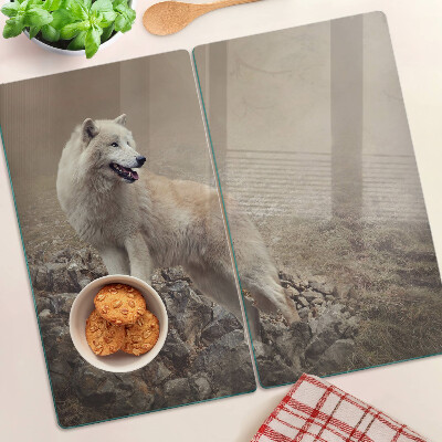 Glass kitchen board Wolf on a rocky mountain