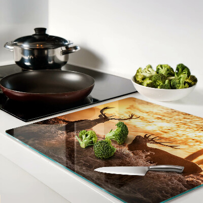 Glass chopping board Deer in the forest at sunset