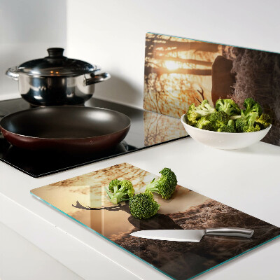 Glass chopping board Deer in the forest at sunset