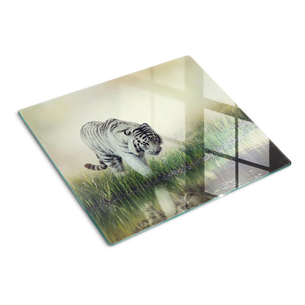 Glass kitchen board Tiger in the grass