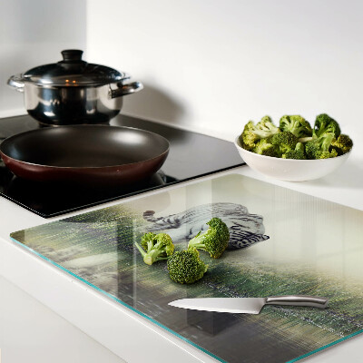 Glass kitchen board Tiger in the grass