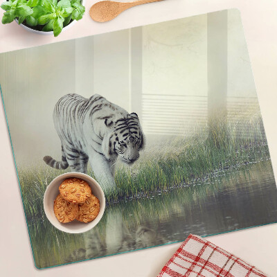 Glass kitchen board Tiger in the grass