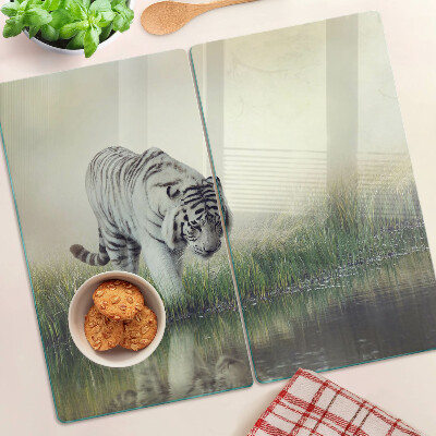Glass kitchen board Tiger in the grass