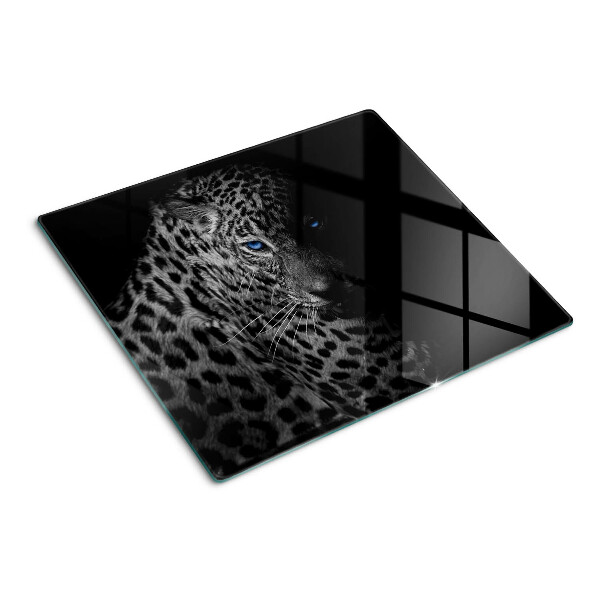 Glass chopping board Left panther with blue eyes