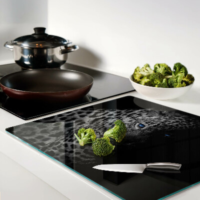 Glass chopping board Left panther with blue eyes
