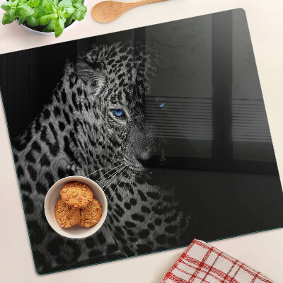 Glass chopping board Left panther with blue eyes