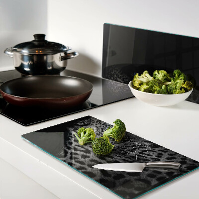 Glass chopping board Left panther with blue eyes