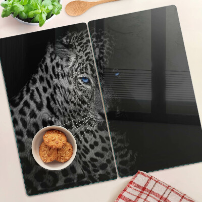 Glass chopping board Left panther with blue eyes