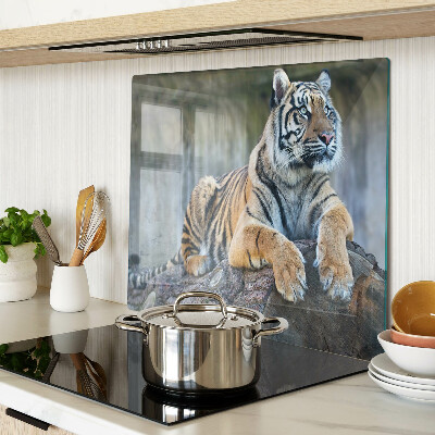 Glass kitchen board Tiger on a tree trunk