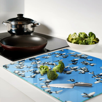 Glass chopping board Pigeons flying in the sky