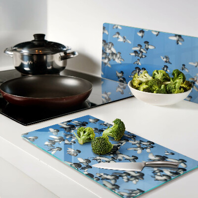 Glass chopping board Pigeons flying in the sky