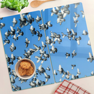 Glass chopping board Pigeons flying in the sky