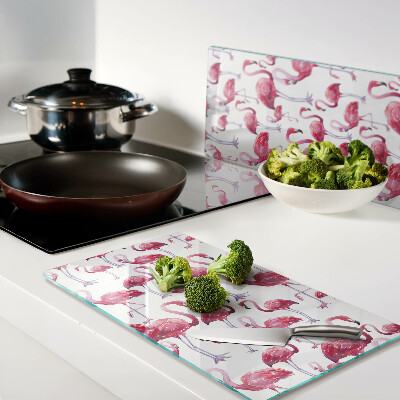 Glass kitchen board Flamingos on a white background