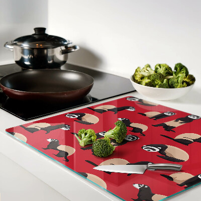 Glass kitchen board Ferrets on a red background