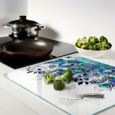 Glass chopping board Peacock feathers in green and blue colors