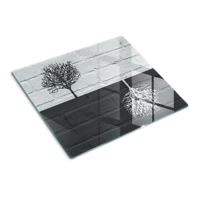 Glass kitchen board Tree against the background of bricks