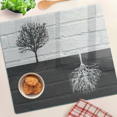 Glass kitchen board Tree against the background of bricks