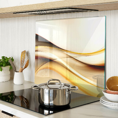 Glass kitchen board Abstract waves in shades of gold
