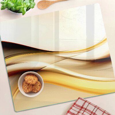 Glass kitchen board Abstract waves in shades of gold