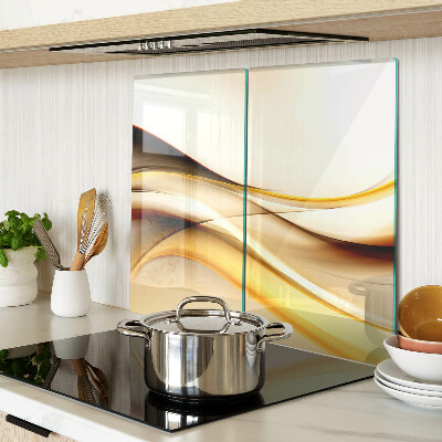 Glass kitchen board Abstract waves in shades of gold