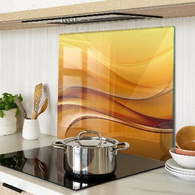 Glass kitchen board Waves in shades of gold