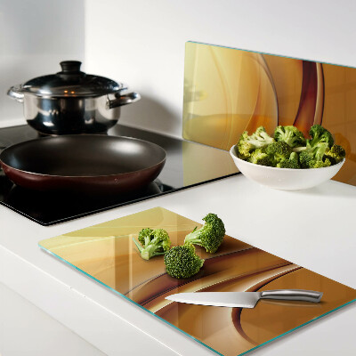Glass kitchen board Waves in shades of gold