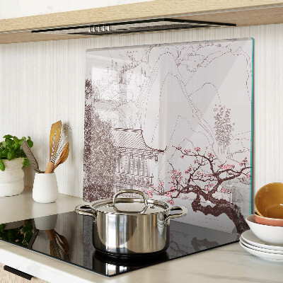 Glass kitchen board Mountain landscape with flowering trees
