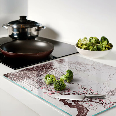 Glass kitchen board Mountain landscape with flowering trees