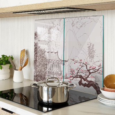 Glass kitchen board Mountain landscape with flowering trees