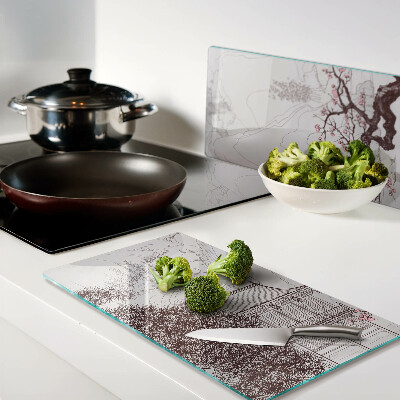 Glass kitchen board Mountain landscape with flowering trees