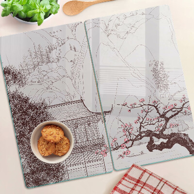 Glass kitchen board Mountain landscape with flowering trees