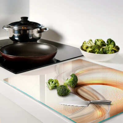Glass kitchen board Light waves in shades of gold