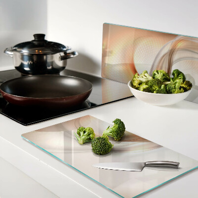 Glass kitchen board Light waves in shades of gold